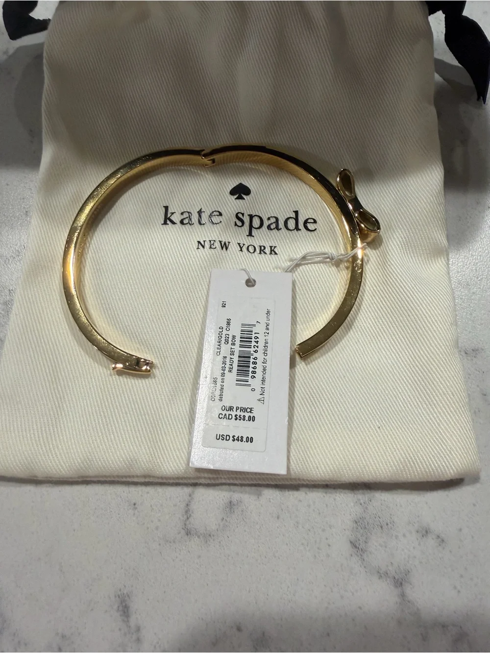 Kate Spade Lady Tie Bow Crystal Hinged Bangle Bracelet Gold Tone NWT - Picture 2 of 5